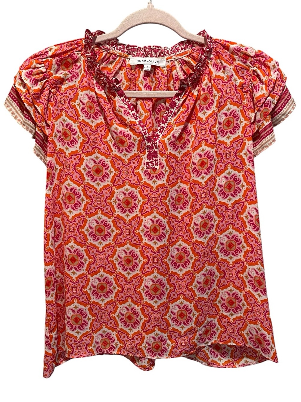Rose & Olive floral print blouse with a ruffled split neckline. Size S